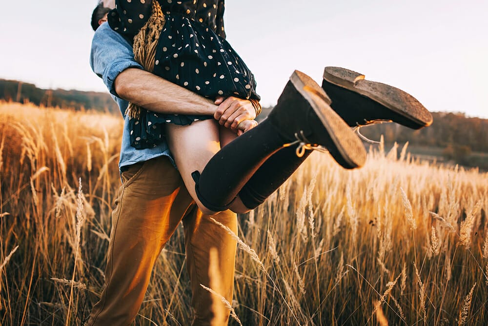 portrait photography couples field boots warm spinning