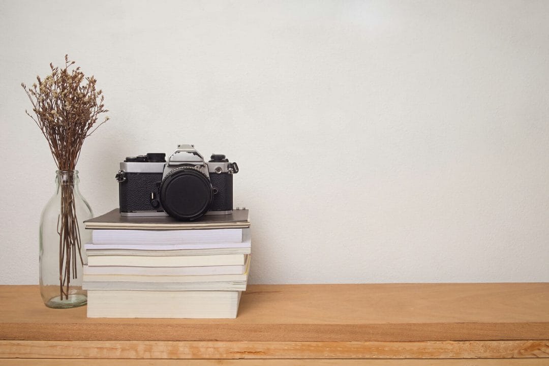 camera film photography books desk creative block