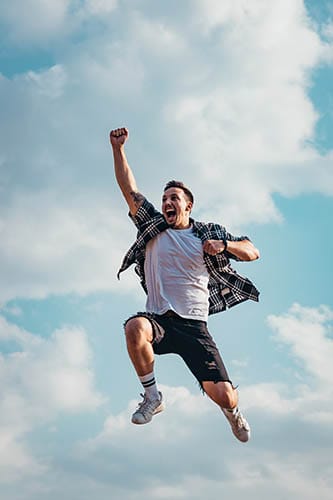 happy man leaping into air stretch effect
