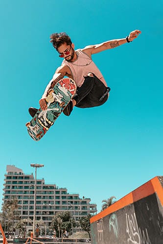 man jumping on skateboard stretch effect