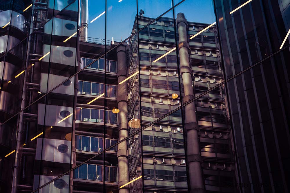 reflections on the windows of a building in London