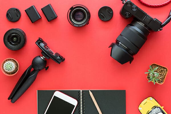 10 things I wish I knew before I became a photographer red camera flatlay