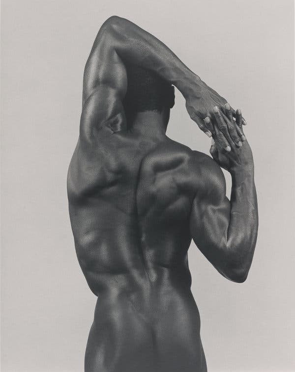 a muscular man with his back turned  LGBTQ+ photography