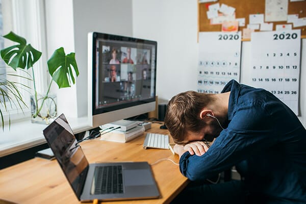 how to motivate for photographers blog image 2 how to motivate for photographers blog image man with head on desk in front of computer
