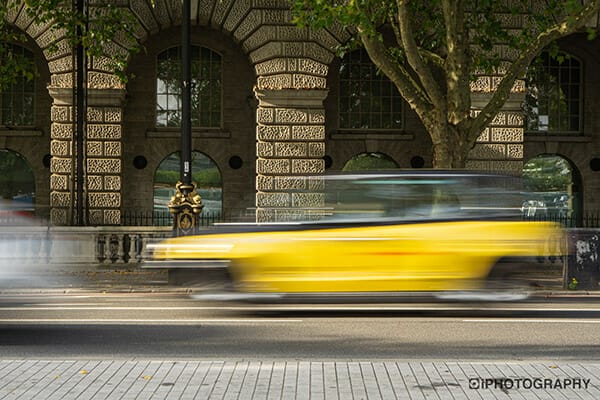 photography ghosting black cab with yellow liverylondon