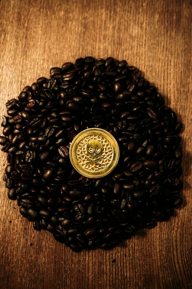 How to do product photography flat lay coffee beans with a skull coin in the middle