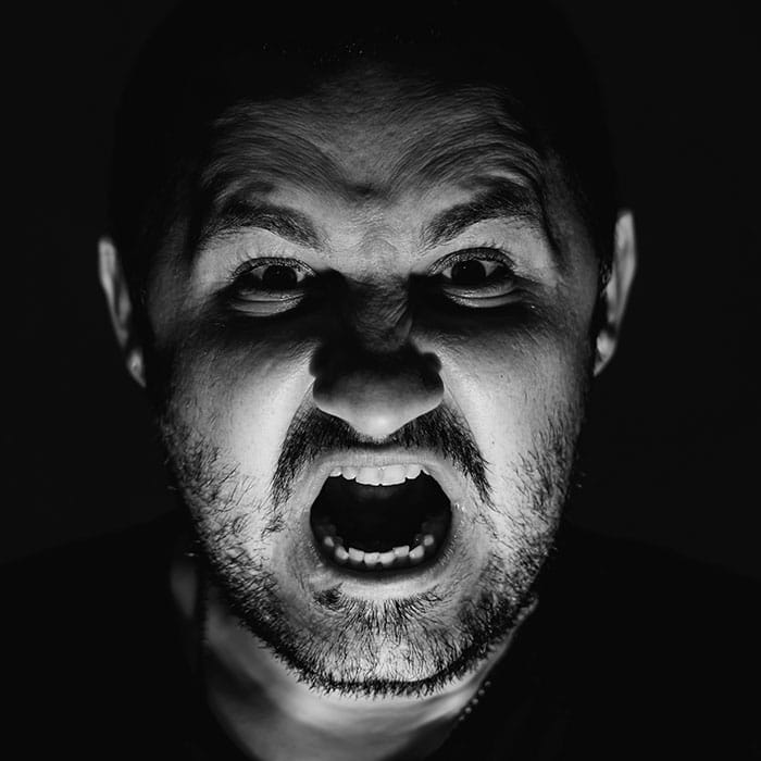 Close-up,Portrait,Of,A,Man,Screaming,,Mouth,Wide,Open,,Light