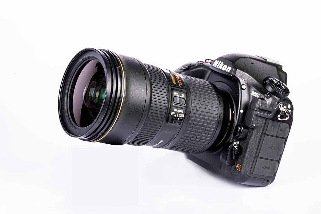 Kuwait, December 11, 2020 : Nikon d850 Full frame 45.7 megapixels Camera with Nikon 24-70mm 2.8E ED Lens on White Background.