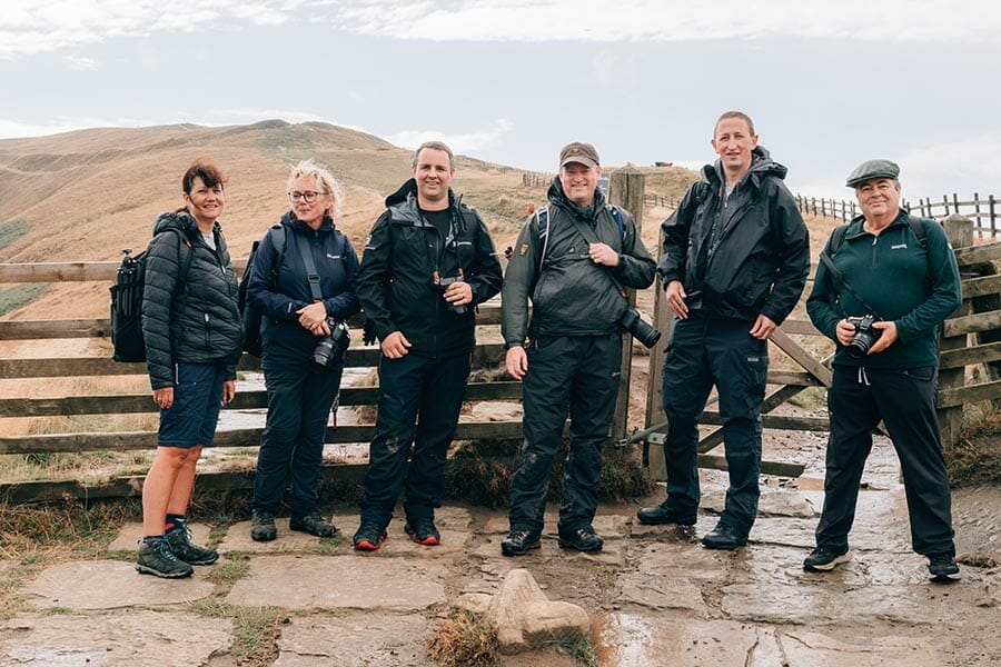 group of photographers at mam tor in the peak district uk