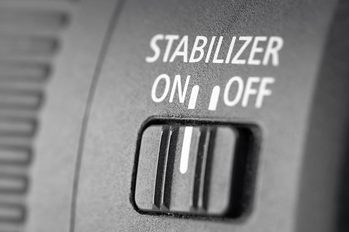 Close-up of the stabilization of the switch button in a modern lens, macro photography