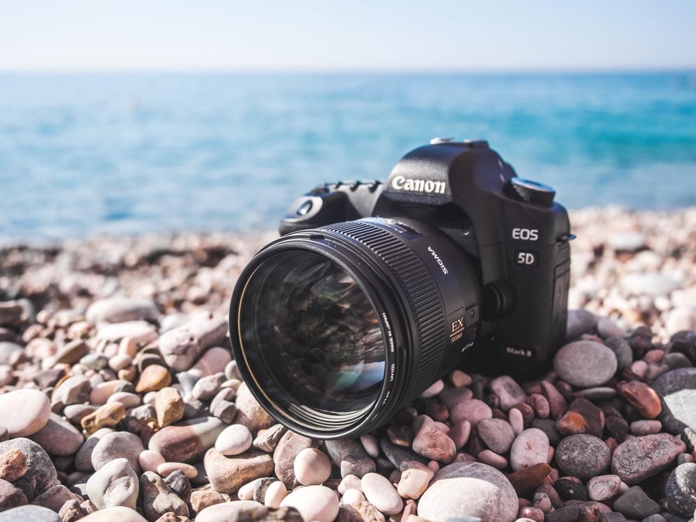 rime Fast Sigma 85mm portrait lens on Canon 5D mark 2 interchangeable-lens professional dslr camera on the beach. Dustproof. Mediterranean sea