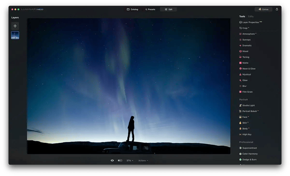 Screenshot of Luminar Neo Neon Glow Effect a person stood on a car roof at night time. Stars are in the sky.