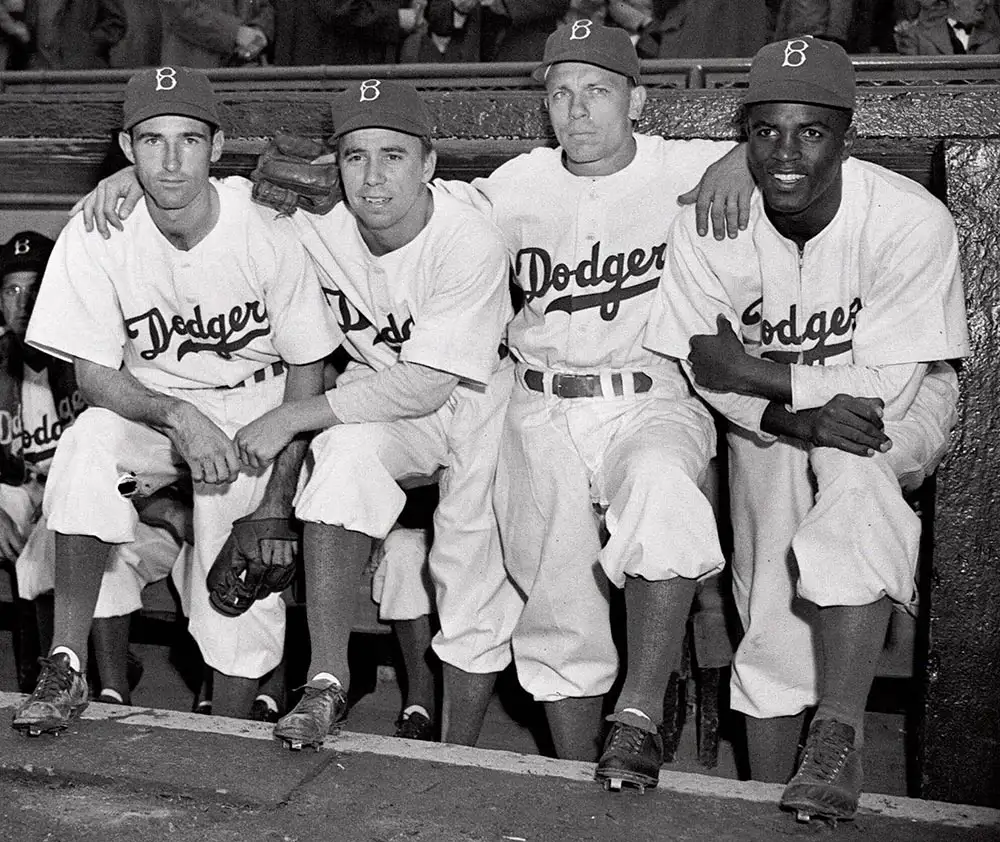 black and white photo of four players for the LA Dodgers baseball team in 1947